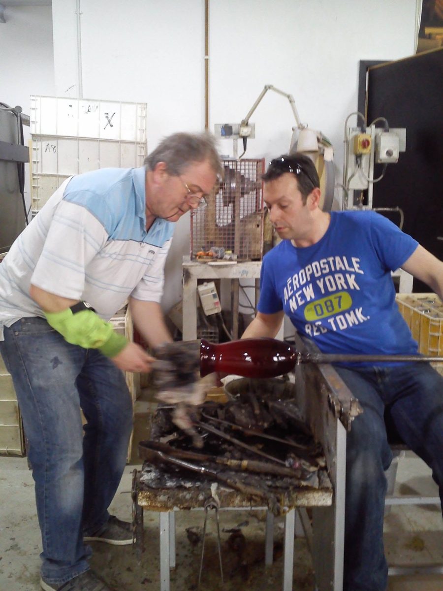 Master craftsman creating handmade crystal at The Irish Handmade Glass Company in Waterford City's Viking Triangle