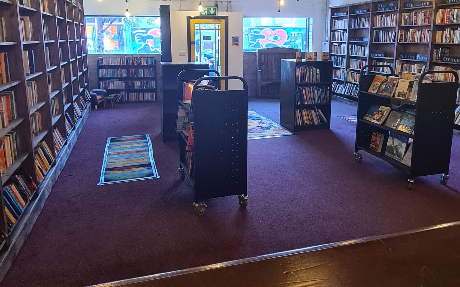 Bookshelves and display stands inside Little Lane Bookshop in Waterford